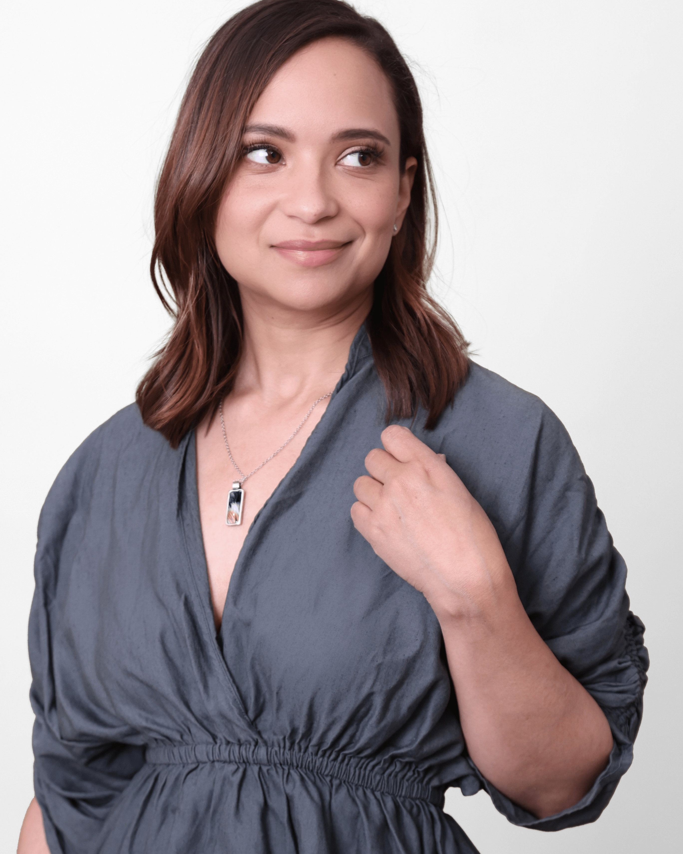 Balance Necklace — Prozac - Quantum Sunshine. Handmade jewelry featuring vivid microscopy sealed in resin. Science-inspired wearable art and meaningful science gift for doctors and STEM professionals. On figure.