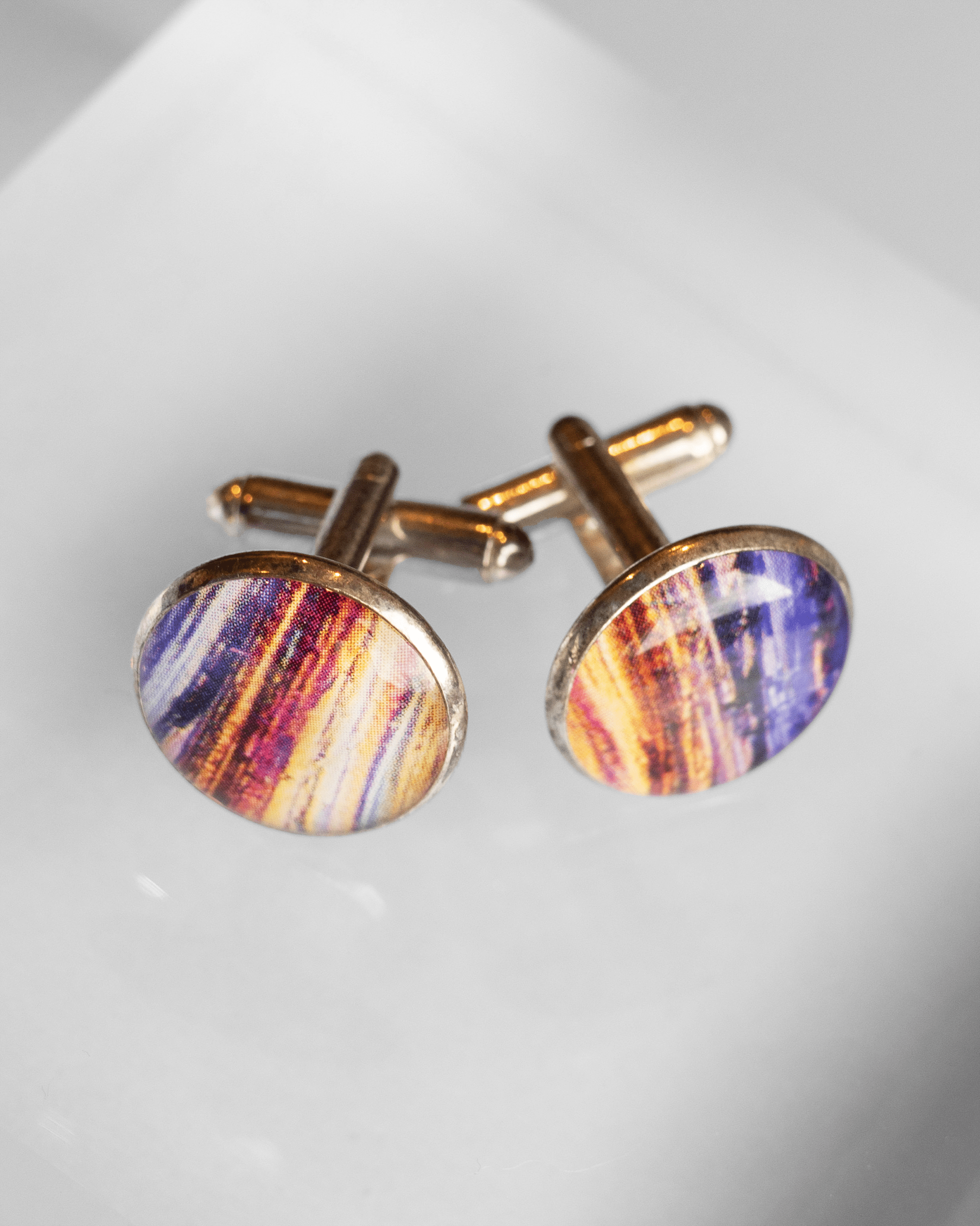 Handmade caffeine molecule microscopy cufflinks in silver-plated brass with resin finish. Science jewelry gift for doctors and STEM professionals. Above shot.
