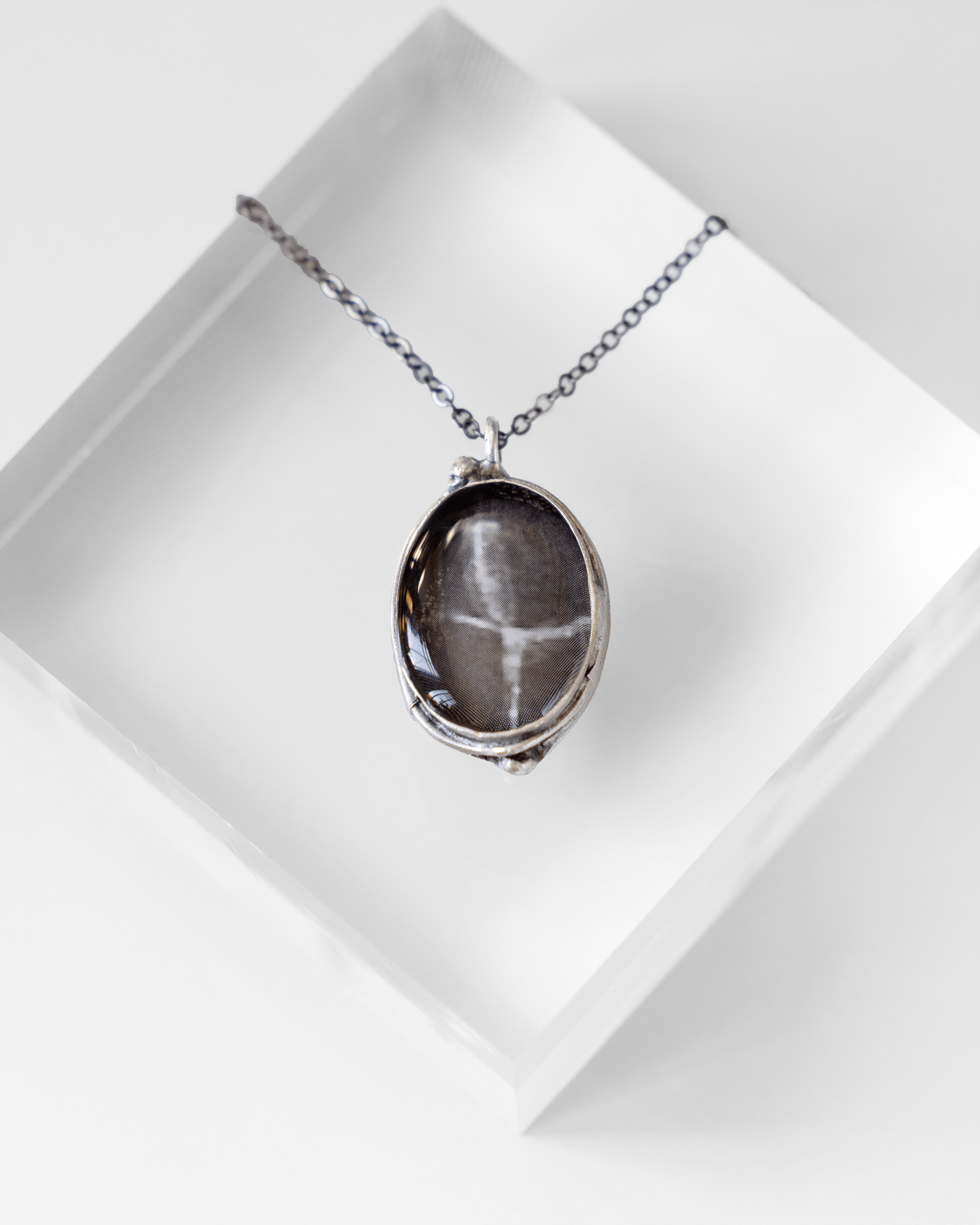 Unique ultrasound anatomy necklace handmade in resin and silver. Science art jewelry reflecting resonance and the beauty of sound.