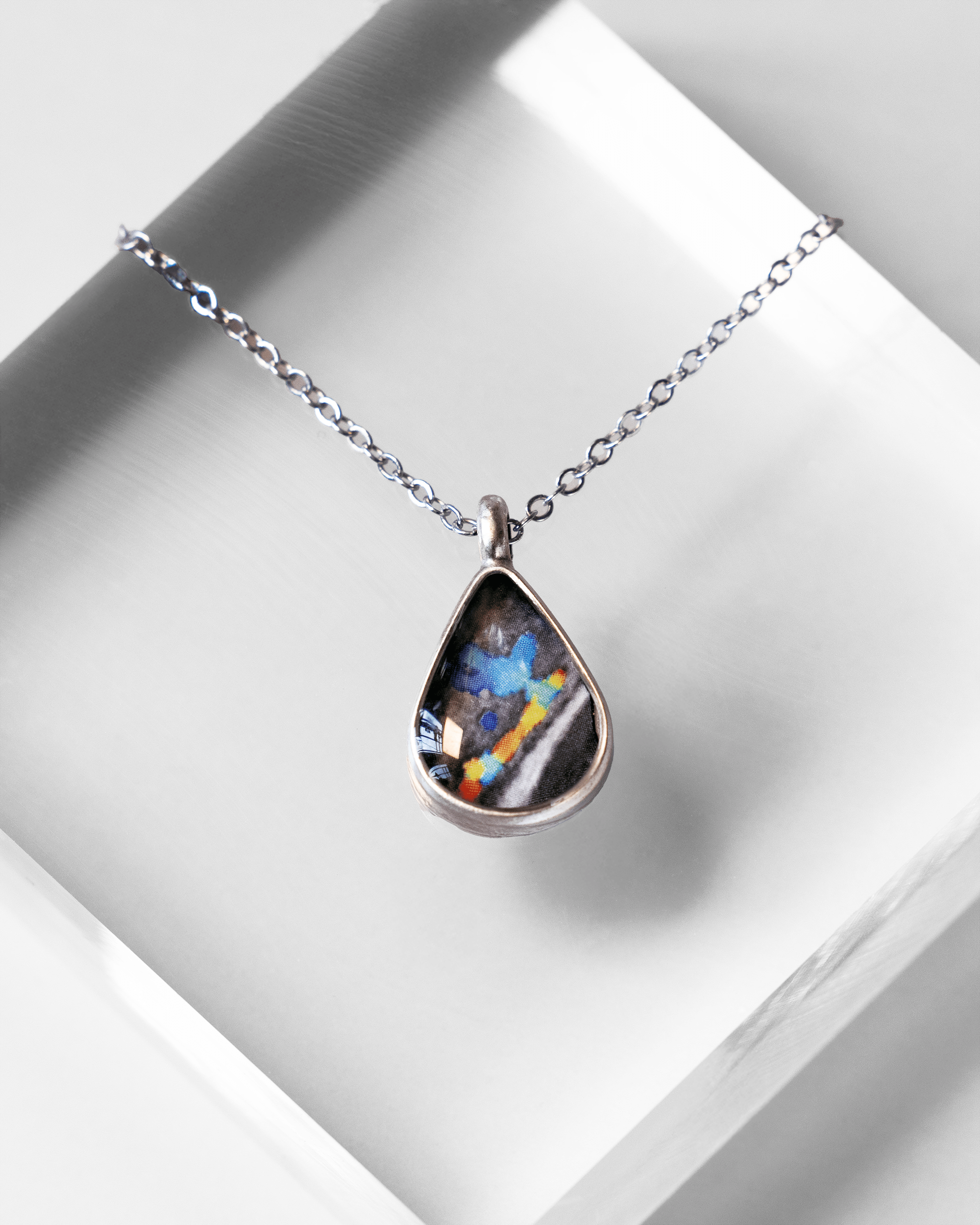 Heartbeat Necklace – Ultrasound Jewelry - Quantum Sunshine. Handmade jewelry featuring vivid ultrasound sealed in resin. Science-inspired wearable art and meaningful science gift for doctors and STEM professionals. Up close.