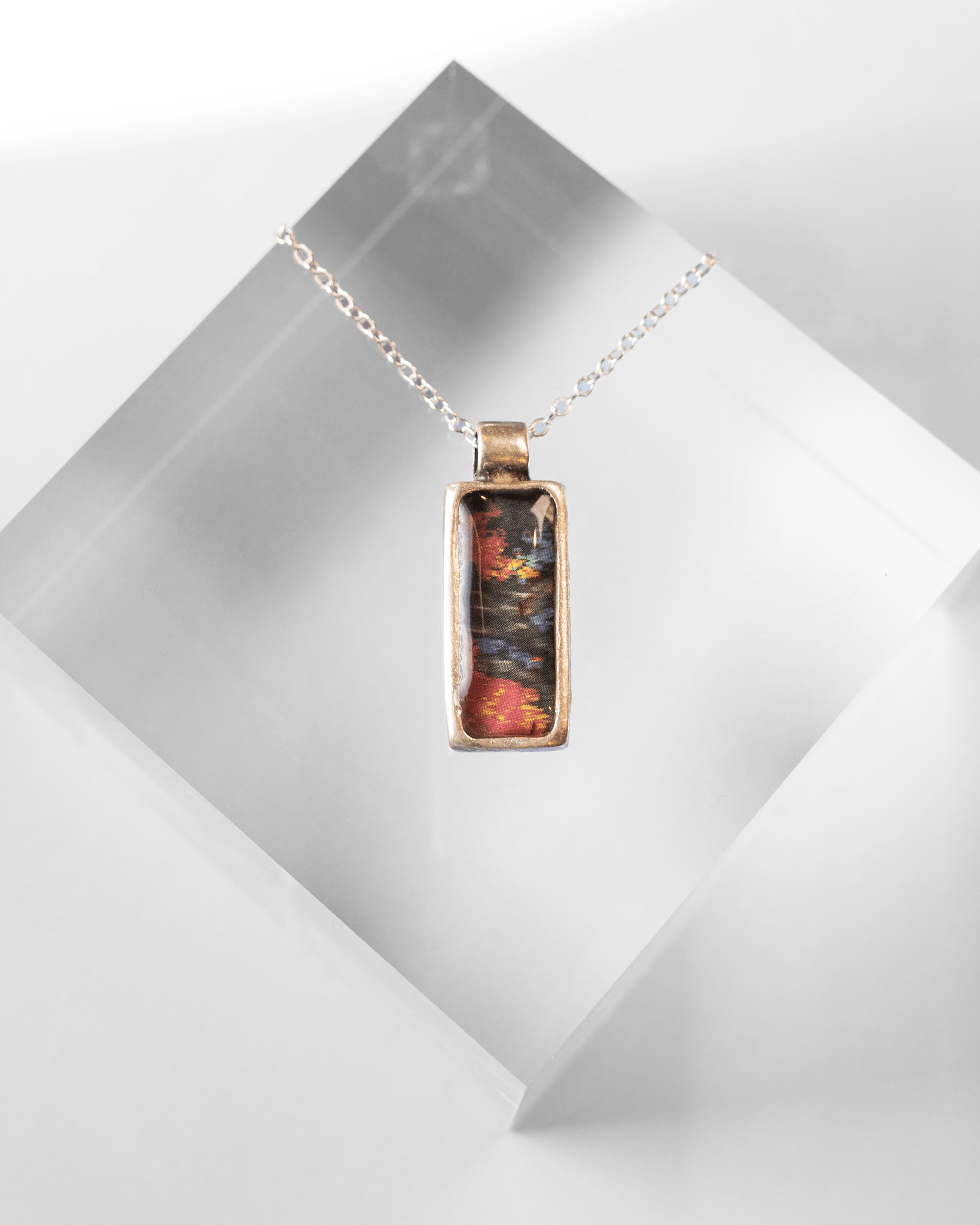 Handcrafted ultrasound heart necklace in resin. Wearable anatomy-inspired science jewelry celebrating life and emotion.