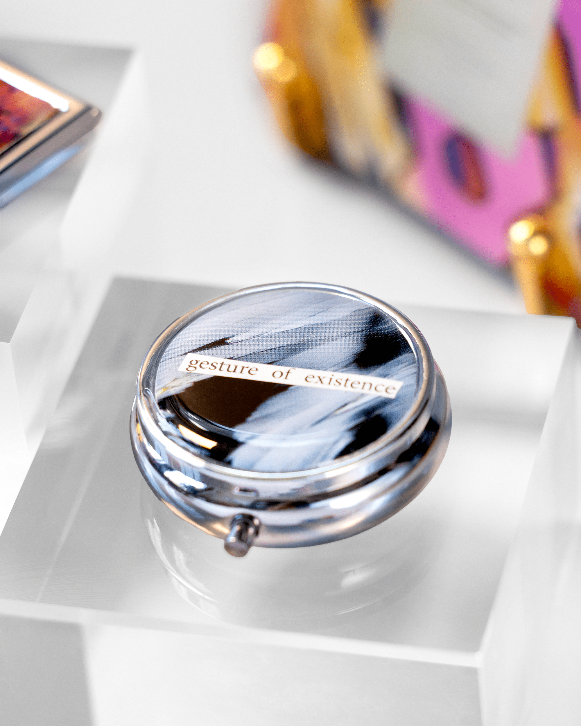 “Gesture of Existence” BitBox – Prozac Microscopy in Resin & Collage - Quantum Sunshine.  Handmade prozac pill case featuring vivid microscopy art sealed in resin. Science-inspired pillbox and meaningful STEM gift for thinkers and dreamers. Product shot.