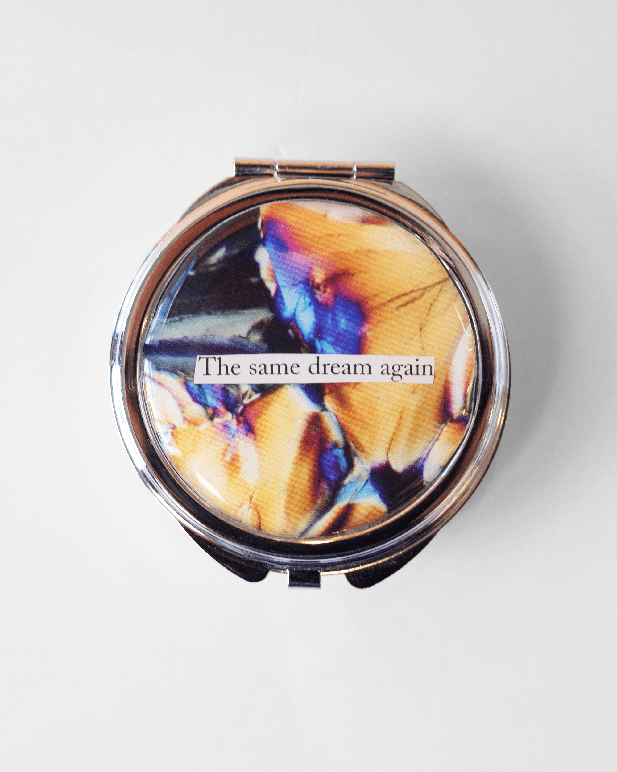 Recurring Dream - Large Pill Case - Quantum Sunshine. Handmade pill case featuring vivid microscopy art sealed in resin. Science-inspired pillbox and meaningful Science gift for doctors and STEM professionals.