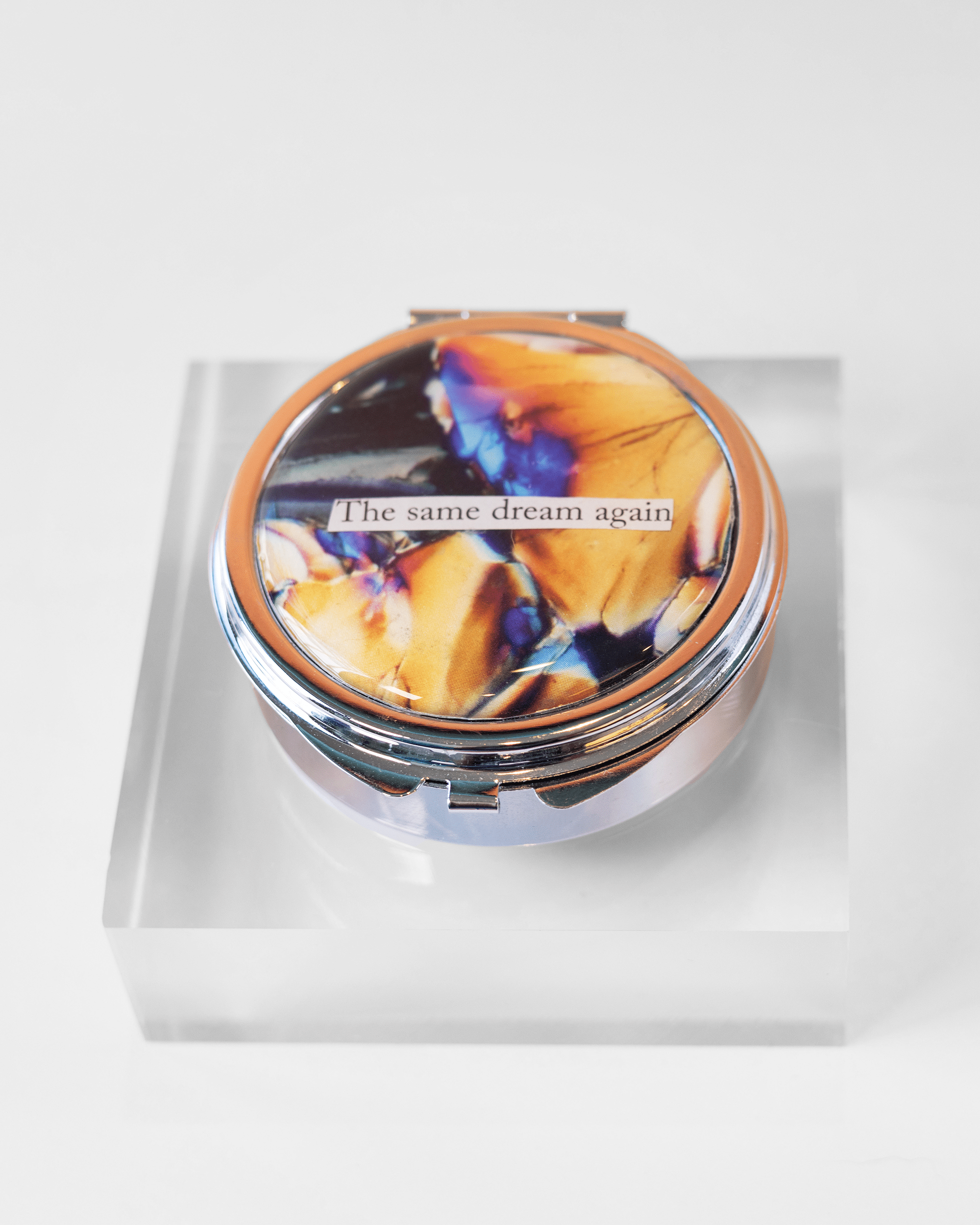 Recurring Dream - Large Pill Case - Quantum Sunshine. Handmade pill case featuring vivid microscopy art sealed in resin. Science-inspired pillbox and meaningful Science gift for doctors and STEM professionals. Front.