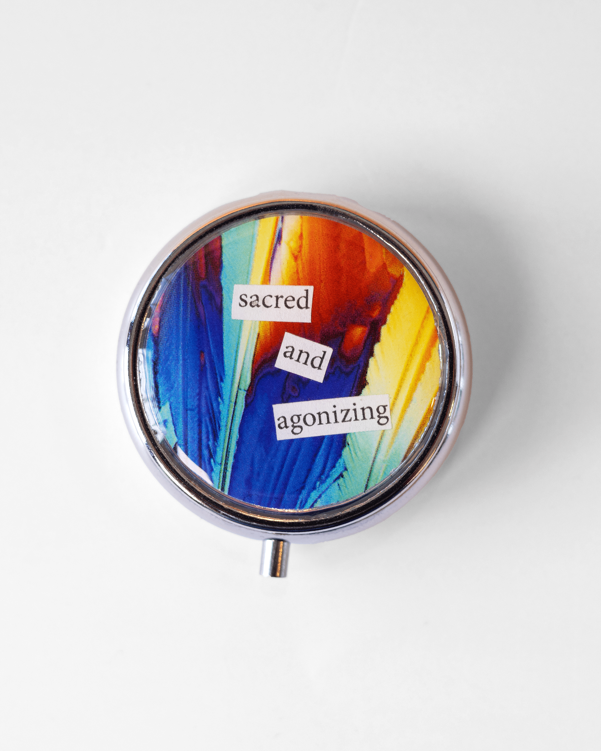 Sacred + Agonizing - Pill Case - Quantum Sunshine. Handmade pill case featuring vivid microscopy art sealed in resin. Science-inspired pillbox and meaningful Science gift for doctors and STEM professionals.