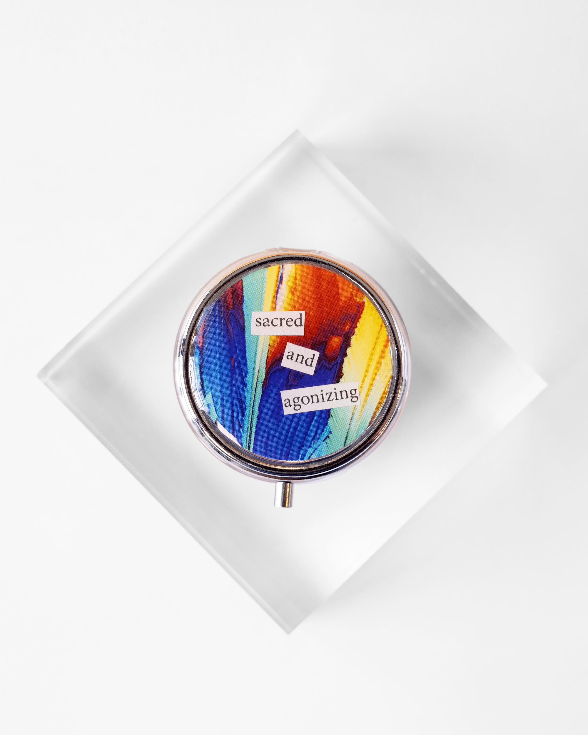 Sacred + Agonizing - Pill Case - Quantum Sunshine. Handmade pill case featuring vivid microscopy art sealed in resin. Science-inspired pillbox and meaningful Science gift for doctors and STEM professionals. Front.
