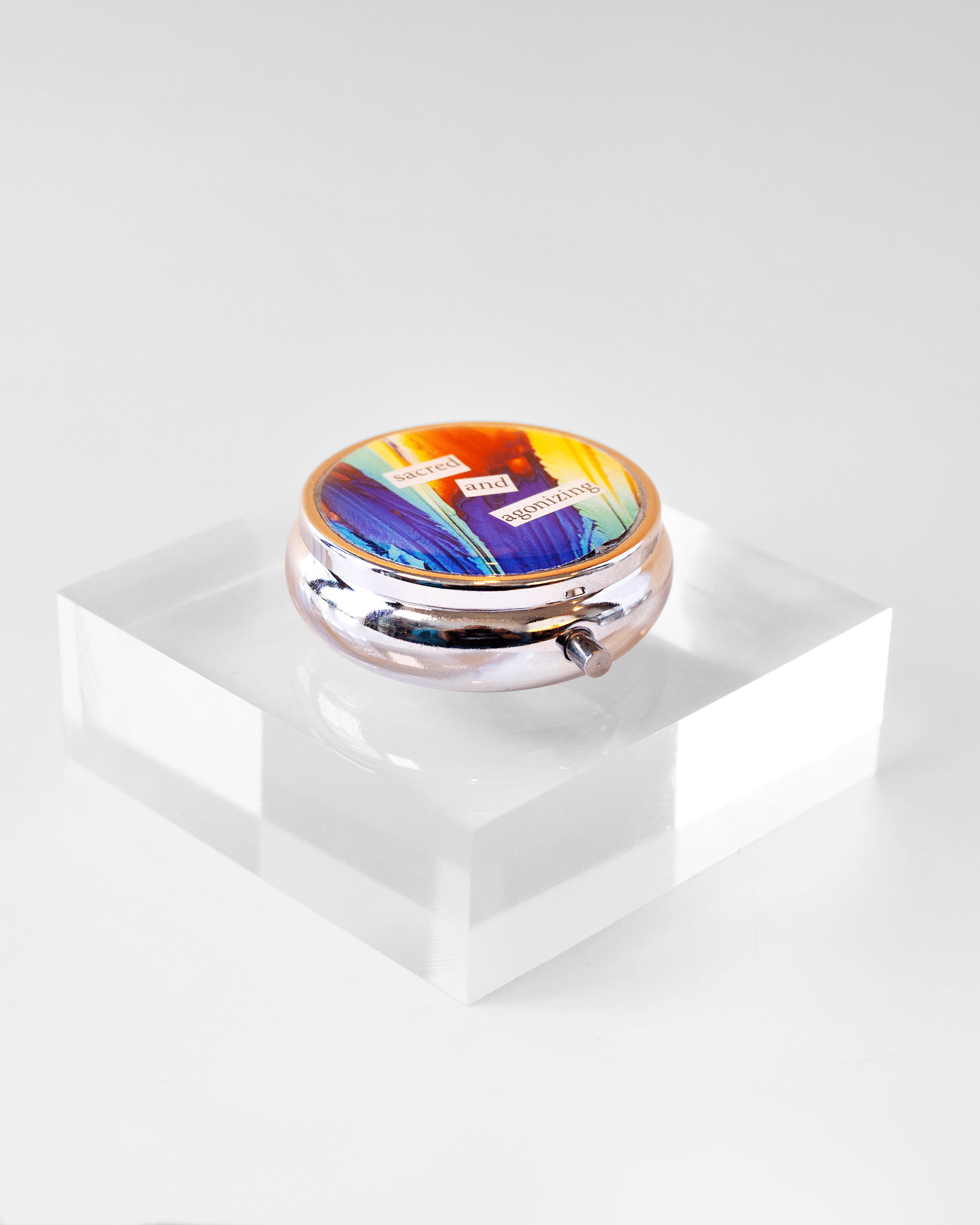 Sacred + Agonizing - Pill Case - Quantum Sunshine. Handmade pill case featuring vivid microscopy art sealed in resin. Science-inspired pillbox and meaningful Science gift for doctors and STEM professionals. Side.