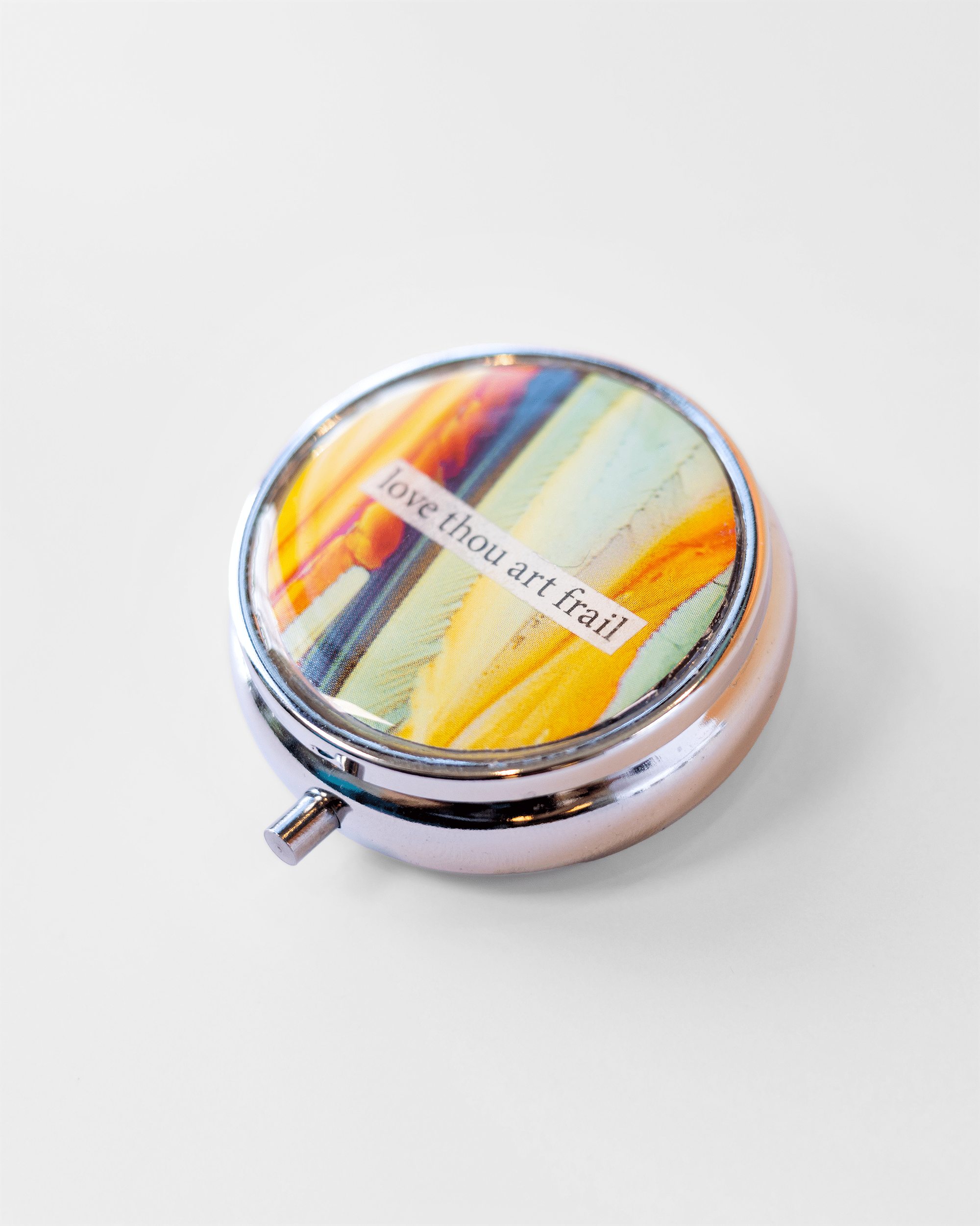 The Frailty of Love - Pill Case - Quantum Sunshine. Sacred + Agonizing - Pill Case - Quantum Sunshine. Handmade pill case featuring vivid microscopy art sealed in resin. Science-inspired pillbox and meaningful Science gift for doctors and STEM professionals. Side.